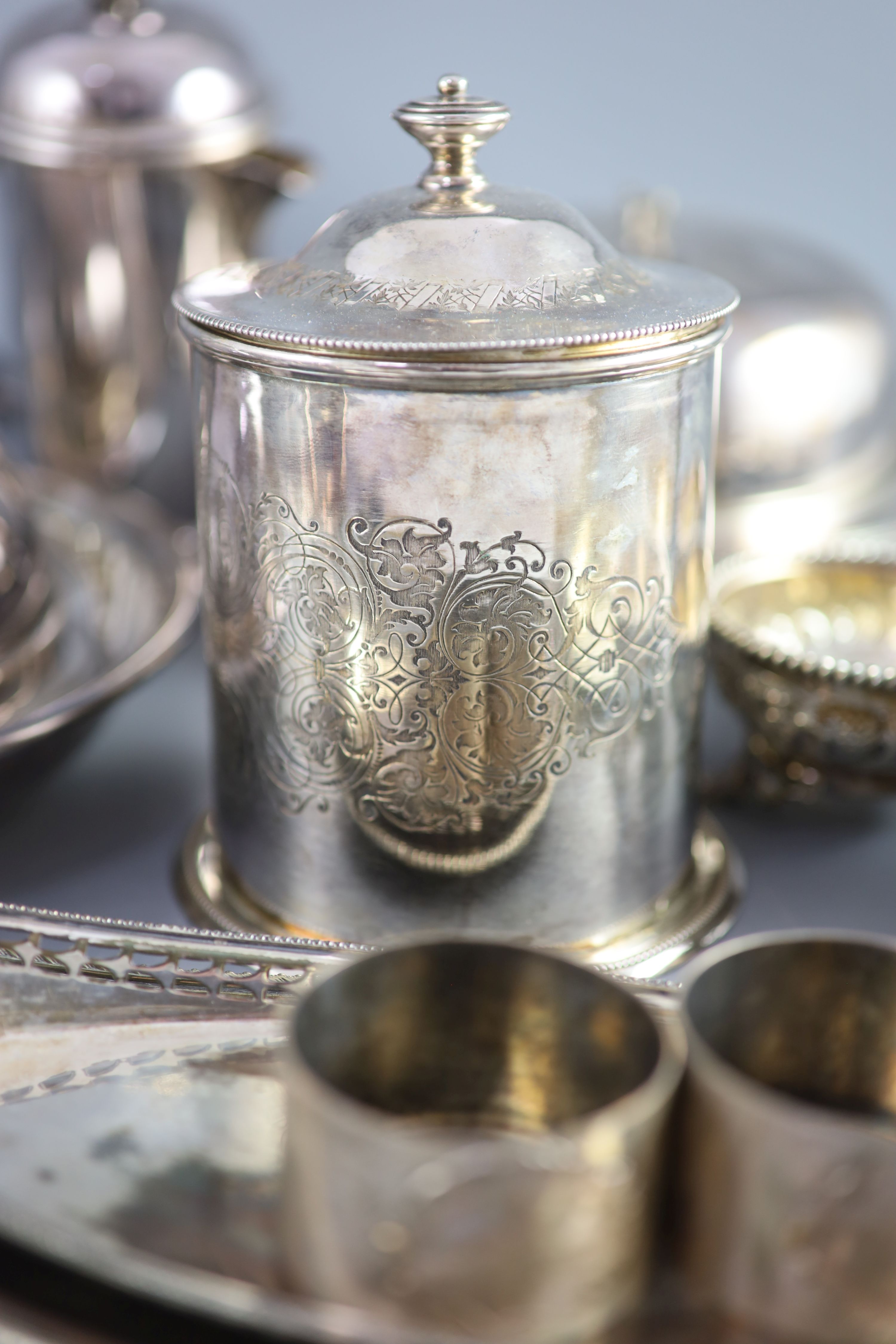 A silver plated egg cruet, a butter dish, a table salt and sundry other plated wares